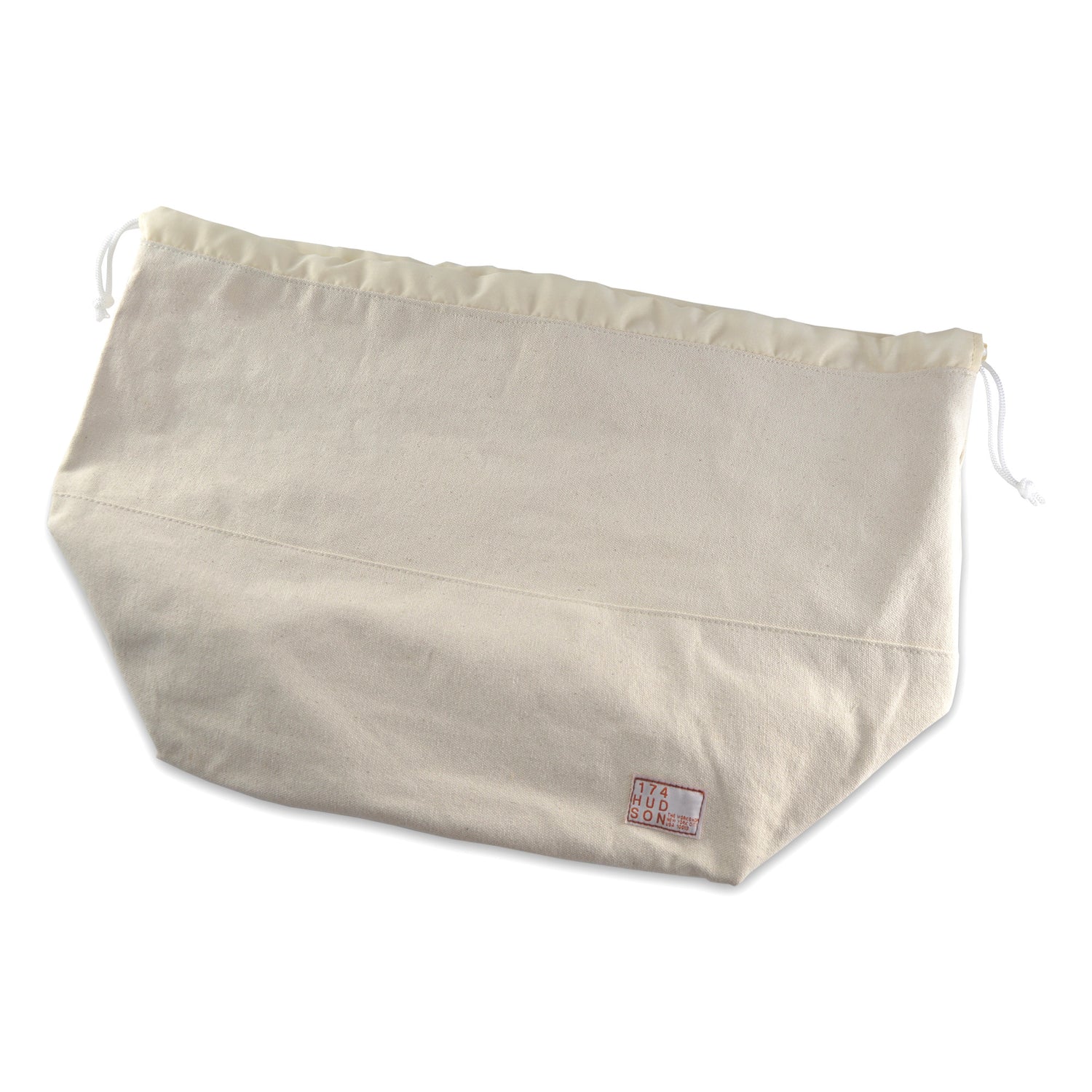 The Priority Bicycles Basket Bag Liner with Drawstring in Cream